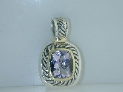 David Yurman Silver/ 14K Yellow Gold, Amethyst Pen: Beautiful David Yurman 14k Yellow Gold /Silver, Amethyst Pendant. The total pendant's weight is 10.4 grams. The size of Amethyst: 12 x 9 mm. The size of the Pendant is approximately 30 x 18 x 9 mm.