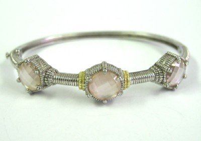 Judith Ripka 18K Gold/Silver, Pink Quartz Bangle: Judith Ripka 18K Yellow Gold / Silver, Pink Quartz Bangle. The total weight of Bangle is 21.1 grams. The measurements of Pink Quartz: 8 x 8 mm. The size of Bangle is 53 x 47 mm, the surface is 3 mm wi
