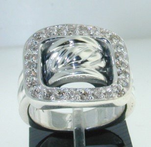 David Yurman Silver & Diamond Ring: David Yurman Silver & Diamond Ring. The total ring's weight is 14.1 grams. The total weight of diamond is 51 pts. approximately , H color VS clarity. The Ring Face is 17 x 15mm. The size of the ring i