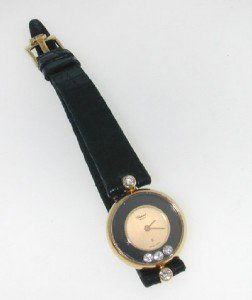 Chopard 18K Yellow Gold, Happy Diamond Strap Watch: Chopard 18K Yellow Gold, Happy Diamond Strap Watch. Watch's Weight : 13.4 grams. Total weight of Happy diamond: 0.35 cts, G color, VS clarity. The length of watch: 6.25". Swiss made.