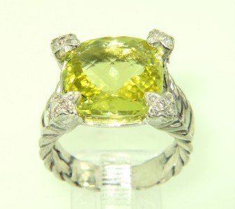 David Yurman Silver, Lemon Citrine & Diamond Ring.: David Yurman Silver, Lemon Citrine & Diamond Ring. The total ring's weight is 9.2 grams. The total weight of the diamond is 0.25 cts approximately, H color VS clarity. The size of the Lemon Citrine is