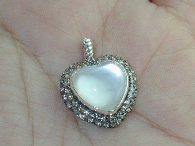 David Yurman Silver, Mother Of Pearl & Diamond Pen: David Yurman Silver, Mother Of Pearl & Diamond Heart Pendant. The total Pendant's weight is 6.8 grams. The total weight of diamonds is 0.43 cts. approximately I and SI clarity. The size of the Mother 