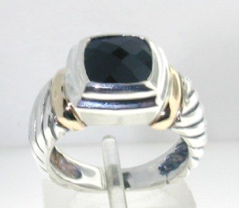 David Yurman Silver & 14K Yellow Gold Onyx Ring.: David Yurman Silver & 14K Yellow Gold Onyx Ring. The total ring's weight is 6.8 grams. The size of the Onyx is 8 x 8 mm. The size of the ring is 5.75".