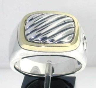 David Yurman Silver & 14K Yellow Gold Ring.: David Yurman Silver & 14K Yellow Gold Ring. The total ring's weight is 16.7 grams. The measurement of ring's face: 18 x 13 mm. The size of the ring is 12".
