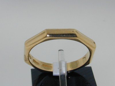 Bvlgari 18K Yellow Gold Ring: This is an Authentic Bvlgari 18K Yellow Gold Ring. The total ring's weight is 3.6 grams. The measurement on the sureface of the ring's face is 2 mm wide. The size of the ring is 6".