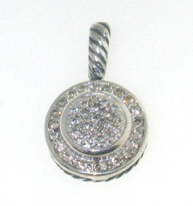 David Yurman Silver Diamond Pendant: David Yurman Silver Diamond Pendant. The total Pendant's weight is 3.6 grams. The total weight of diamonds is 0.73 cts. approximately I and SI clarity. The size of the Pendant is 21 x 14 mm, Thickness