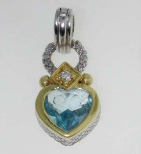 Judith Ripka Silver/18K Gold,BlueTopaz,Diamond Pen: Judith Ripka Silver/ 18K Yellow Gold, Blue Topaz & Diamond Pendant. The weight of the Pendant is 5.7 grams. The size of the Blue Topaz is 6 mm.The total weight of diamond: 0.05 pts. H color VS clarity