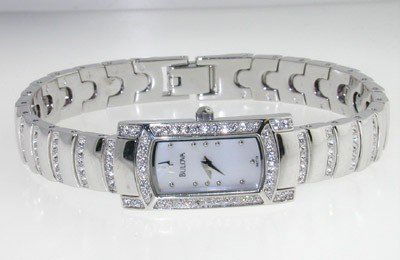 Bulova stainless steel diamond watch: Bulova Stainless Steel Diamond Watch. The total watch's weight is 42.7 grams. The total weight of diamond: 3 cts. I color SI clarity. The measurements of watch head is 22 x 15 mm and 4 mm thick. The l