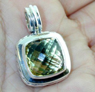 David Yurman Silver & Lemon Citrine Pendant.: David Yurman Silver & Lemon Citrine Pendant. The weight of the Pendant is 10.8 grams. The size of the Lemon Citrine is 13 x 13 mm. The size of the pendant is 30 x 20 mm.