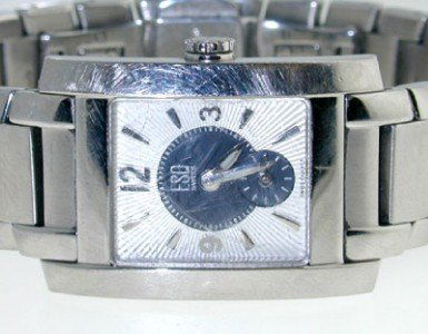 ESQ Stainless Steel Watch: ESQ Stainless Steel Watch The total watch's weight is 64.6 grams. The measurements of watch head is 22 x 19 mm and 5 mm thick. The length of watch: 6" swiss made water resistant Chain is 14 mm wide