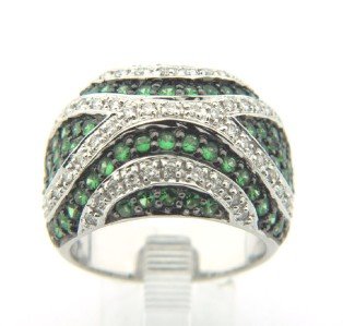 Salavetti 18K White Gold, Diamond & Tsavorite Ring: Salavetti 18K White Gold, Diamond & Tsavorite Ring. The total ring's weight is 14.5 grams. The total diamond weight is 1 cts. approxmiately. H color, VS clarity. The total weight of Tsavorite: 2.1 cts