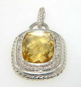 David Yurman Silver, Lemon Citrine & Diamond Penda: David Yurman Silver, Lemon Citrine & Diamond Pendant The total weight of Pendant is 15.9 grams Size of Lemon Citrine: 18 x 13 mm Total weight of diamond: 0.5 cts, I color, SI-2 clarity The size of the