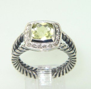 David Yurman Silver Lemon Citrine & Diamond Ring.: David Yurman Silver Lemon Citrine & Diamond Ring. The total ring's weight is 5.9 grams. The total weight of the diamond is 0.2 cts approximately, I color SI clarity. The size of the Lemon Citrine is 7