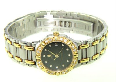 Concord 14K Yellow gold /Stainless Steel Watch: Concord 14K Yellow Gold /Stainless Steel Watch The total watch's weight is 56.6 grams. The measurements of watch head is 21 x 22 mm and 5 mm thick. The length of watch: 6.5" water Resistant swiss made