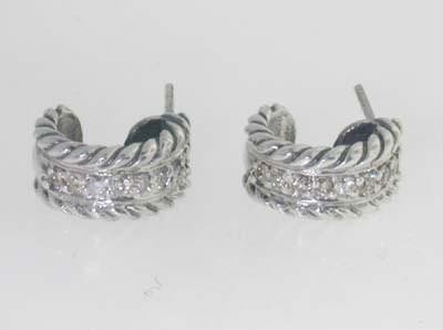 David Yurman silver, Diamond Earrings: David Yurman silver, Diamond Earrings Earring's weight : 3.6 grams. The weight of Diamond: 0.32cts. I color, SI clarity The measurements of the earrings is 11 x 5 mm
