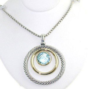 David Yurman 18K Gold/ Silver, Blue Topaz Necklace: David Yurman 18K Yellow Gold /Silver, Blue Topaz Necklace. The total weight of Necklace is 13.2 grams. The measurements of Blue Topaz: 9 mm The size of the pendant is 37 x 29 mm, Thickness is 2 mm. Th