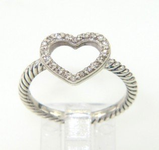 David Yurman Silver, Diamond Ring: David Yurman Silver, Diamond Ring The total ring's weight is 2.7 grams. The total weight of diamond is 0.13 cts. approximately , I color SI clarity. The size of the ring's surface is 9 x 11 mm The siz