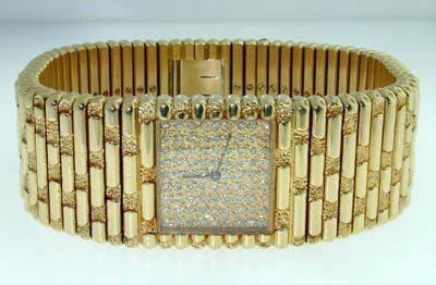 Piaget 18K Yellow Gold, Diamond Watch: Piaget 18K Yellow Gold, Diamond Watch.Watch's Weight :190.4 grams.Total weight of diamonds: 1cts, G color, VVS clarity.The length of watch: 6" , Swiss made.Water resistant.Chian is 18 mm wide.