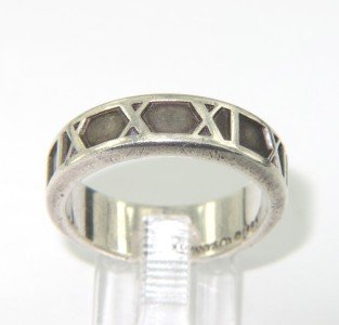 Tiffany & Co Silver Ring.: Tiffany & Co Silver Ring The total ring's weight is 6.2 grams The size of the ring is 7.75