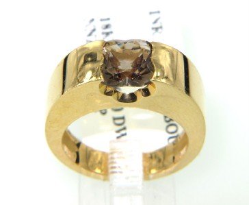 Mauboussin Paris 18K Yellow Gold Smoky Topaz Ring: Mauboussin Paris 18K Yellow Gold Smoky Topaz Ring The total ring's weight is 10.7 grams. The size of Smoky Topaz is 6 x 4 mm The size of the ring is 6