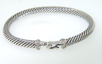 David Yurman Silver, Diamond Bangle: David Yurman Silver, Diamond Bangle. Bangle's Weight: 24.4 grams. Total diamonds weight: 0.10 cts, I color, SI-1 clarity. The measurements of the inside Bangle are 50 x 47 mm and the thickness is 4 mm