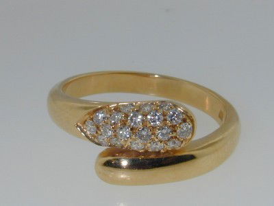 Bvlgari 18K Yellow Gold Diamond Ring: Authentic Bvlgari 18K Yellow Gold Diamond Ring.The total ring's weight is 5.7 grams.The diamonds weight are approximately 0.4 ct., G color and VVS clarity. The size of the ring is 7.5There are stamp "