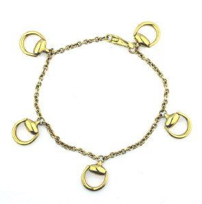 Gucci 18K Yellow Gold Bracelet: Gucci 18K Yellow Gold Bracelet The total bracelet weight is 13.4 grams. The measurements of Bracelet: 6.5"