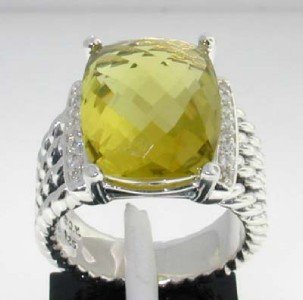 David Yurman Silver, Lemon Citrine & Diamond Ring: David Yurman Silver, Lemon Citrine & Diamond Ring. The total ring's weight is 10 grams. The total diamond weight is 0.32 cts ,approxmiately. I color SI clarity. The size of Lemon Citrine is 15 x 11 mm