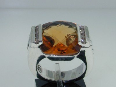 David Yurman Silver Citrine Diamond Ring: David Yurman Citrine Ring with Diamonds in Silver The total ring's weight is 12.2 grams. Ring face is 20 x 14 mm. The size of citrine is 14 x 14 mm. The total diamond weight is 24 pts, H color, VS cla