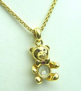 Chopard 18K Gold, Diamond, Ruby & Sapphire Necklace: Chopard 18K Yellow Gold, Diamond, Ruby & Sapphire Necklace.The Necklace weight is 11.2 grams.The total weigth of diamond: 0.05 pts. G color, VS clarity.The total weight Ruby: 0.01 pts.The total weight