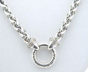 David Yurman Silver & Diamond Necklace: David Yurman Silver & Diamond Necklace. The total weight of Necklace is 26.7 grams. The total weight of diamond: 0.28 cts. I color SI clarity Size of pendant: 13 x 17 mm. thickness : 2 mm. The necklac