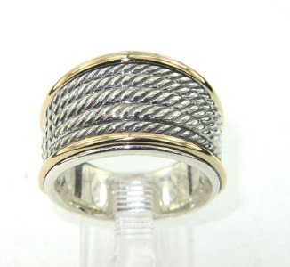 David Yurman Silver, 18K Yellow Gold Ring: David Yurman Silver,18K Yellow Gold Ring. The total ring's weight is 13.8 grams. The size of the ring is 6.5