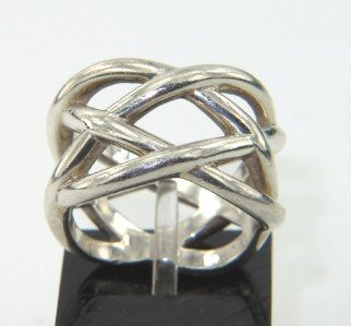 Tiffany & Co Silver Ring.: Tiffany & Co Silver Ring. The total ring's weight is 7.5 grams. The size of the ring: 4.25 and 10 mm wide