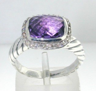 David Yurman Silver, Amethyst & Diamond Ring: David Yurman Silver, Amethyst & Diamond Ring The total ring's weight is 5.3 grams. The total weight of the diamond is 0.24 cts approximately, I color SI clarity. The size of the Amethyst is 10 x 8 mm.