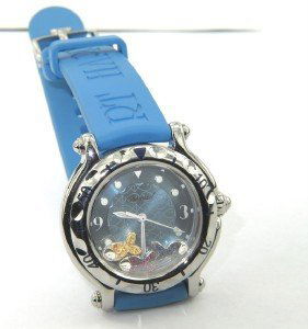 Chopard Stainless Steel Multi-Stone Rubber Strap W: Chopard Stainless Steel, Happy Fish (Ruby, Sapphire & Yellow Sapphire), Rubber Strap Sport Watch Watch's Weight : 45 grams The total weight of multi-color stone: 0.42 cts The length of watch: 8.25" Wa