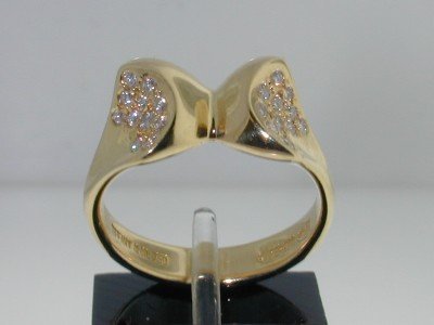 Tiffany &Co 18k Yellow Gold Diamond Ring: Tiffany&Co 18K Yellow Gold Diamond Ring. The total earring's weight is 6.2 grams. The total weight of Diamond: 0.42cts, G color, VS clarity. The size of ring: 6.