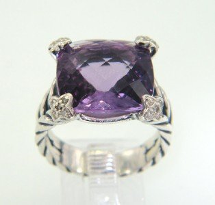 David Yurman Silver Amethyst & Diamond Ring: David Yurman Silver Amethyst & Diamond Ring.The total ring's weight is 9 grams.The total weight of the diamond is 0.25 cts approximately, I color SI clarity.The size of the amethyst is 14 x 14 mm.The 