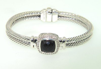 David Yurman Silver, Diamond Onyx Bangle: David Yurman Silver, Diamond Onyx Bangle.Bangle's Weight : 43.5 grams.The size of the Onyx is 10 x 10 mm.The total weight of diamond is 0.30 ct, I color, SI clarity.The measurements of the Bangle are 