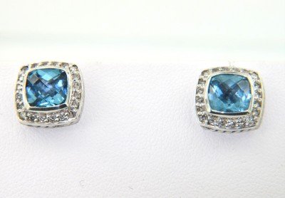 David Yurman Silver Diamond & Blue Topaz Earrings: David Yurman Silver Diamond & Blue Topaz Earrings The weight of the Earring is 5.1 grams. The size of blue topaz is 7 mm in diameter. The size of the earring is 10 mm in diamter, 2 mm in thickness. Th