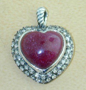 David Yurman Silver Cabochon Ruby,Diamond Heart Pen: David Yurman Silver, Cabochon Ruby & Diamond Heart Pendant. The total Pendant's weight is 6.7 grams. The total weight of diamonds: 0.43 cts. approximately I and SI clarity. The size of the Cabochon Ru