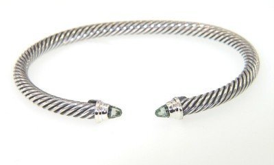 David Yurman Silver, Prasiolite Bangle: David Yurman Silver, Prasiolite Bangle Bangle's Weight : 17.2 grams. The measurements of prasiolite: 2 mm The measurements of the inside Bangle are 49 x 43 mm and the thickness is 3 mm. There is Stamp