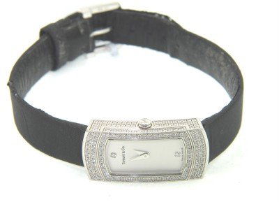 Tiffany & Co 18K Gold, Diamond Leather Strap Watch: Tiffany & Co 18K White Gold, Diamond Leather Strap Watch With Extra Link Watch's Weight : 22.8 grams. Total weight of diamond: 1 cts, H color, VS clarity. The measurement of watch head: 28 x 12 mm and