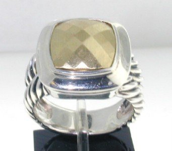 David Yurman Silver/18K Yellow Gold Ring: David Yurman Silver/18K Yellow Gold Ring!Size of ring is 6.25".Ring Weight : 9.8 grams.The measurements of the ring face are 15 x 15 mm.There is Stemp "925" "750"on it.