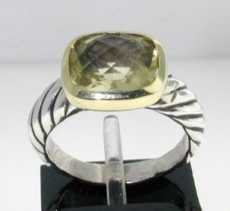 David Yurman 18k Gold/ Silver, Prasolite Ring.: David Yurman 18k Gold/Silver, Prasolite Ring. The total ring's weight is 4.1 grams. The size of the Prasolite is 10 x 8 mm. The measurement of ring's durface is 12 x 11 mm and 5 mm thick. There is D.Y