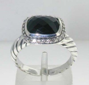 David Yurman Silver,Onyx & Diamond Ring: David Yurman Silver Onyx Diamond Ring.The total ring's weight is 5.2 grams.The total weight of the diamond is 0.24 cts approximately, I color SI clarity.The size of the Onyx is 10 x 8 mm.The size of t