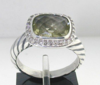 David Yurman Silver, Lime Citrine & Diamond Ring: David Yurman Silver, Lime Citrine & Diamond Ring The total ring's weight is 5.3 grams. The total weight of the diamond is 0.21cts approximately, H color VS clarity. The size of the Lime Citrine is 9 x