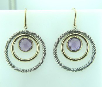 David Yurman 18K Gold /Silver Amethyst Earrings: David Yurman 18K Yellow Gold /Silver and Amethyst Earrings The total earrings weight is 12.7 grams. The size of athe Amethyst is 10 mm in diameter. The size of earrings: 32 x 29 mm. Thickness is 2 mm.