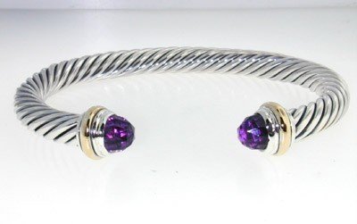 David Yurman Silver,14K Gold, Amethyst Bangle.: David Yurman Silver, 14K Yellow Gold, Amethyst Bangle.The total Bangle's weight is 39.7 grams.The size of amethyst: 6 mm.The measurement of the inside bangle is 47 x 64 mm, Thickness: 6 mm.