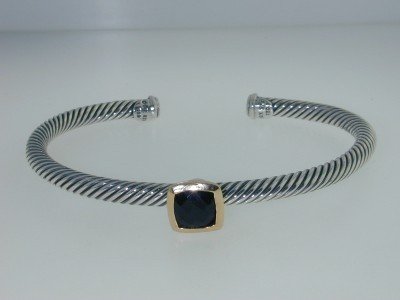 David Yurman 18k Yellow Gold/Silver, Onyx Bangle: David Yurman 18k Yellow Gold/Silver Onyx Bangle Bangle's Weight : 16.8 grams. The size of the Onyx is 7 x 7 mm. The measurements of the Bangle are 60x44 mm and the thickness is 4 mm. There is Stamp D.
