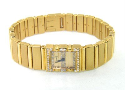 Piaget 18K Yellow Gold, Diamond Watch: Piaget 18K Yellow Gold, Diamond Watch.The total watch's weight is 78.8 grams.The total weight of diamond: 0.78 cts. G color VS clarity.The measurements of watch head is 16 x 13 mm and 4 mm thick.The l